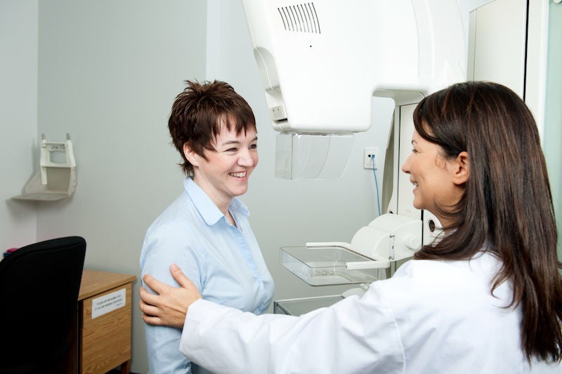 A nurse consulting a patient about a mammogram