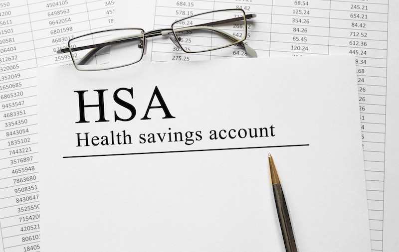 Paper-with-Health-Savings-Account-HSA-on-a-table_171213_193318