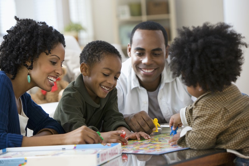 Family playing board games