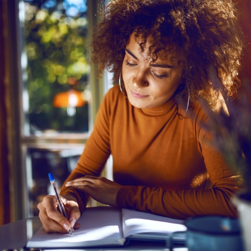 portrait-of-cute-mixed-race-student-with-curly-hair-and-in-turtleneck-picture